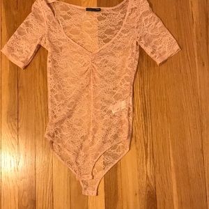 Pale pink laced bodysuit